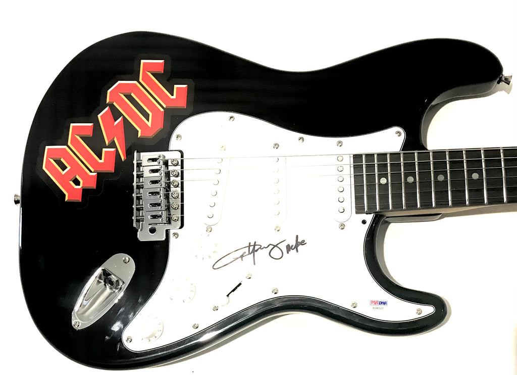 Signed AC/DC full size electric guitar by Angus Young – Collector Kingdom